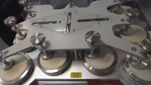 Machine for checking the quality of the fabric, moving parts