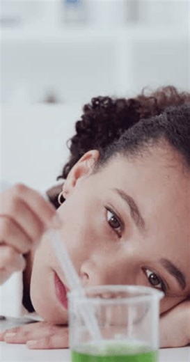 clip-4014119615-beaker-science-yawn-woman-laboratory-development-experiment