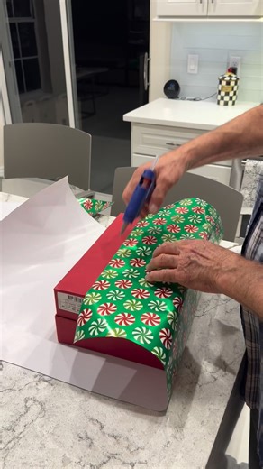 Anne Caserta on Instagram: "This is the way to go. If you have a lot of presents to wrap scotch tape is a lot of money.😩#Christmas #gifts"