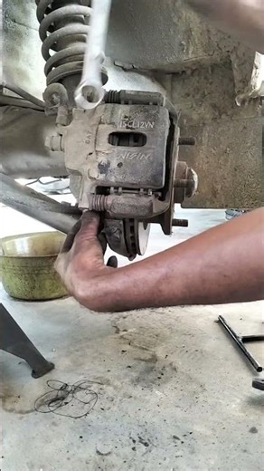 Install the front disc brake caliper #shotsvideo #automobile #mechanic