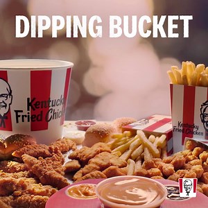 2.1K reactions · 145 shares | The Dipping Bucket comes with FOUR sauces and the Colonel's signature gravy, plus a whole bunch of dippable delights like Tenders, Nuggets and Popcorn. Getting lost in the sauce isn't always a bad thing. | KFC | Facebook