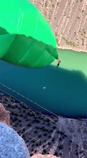 Cliff Dive Challenge: Stunning Jump Onto Inflatable! #BigJump #CliffDiving #AdrenalineRush