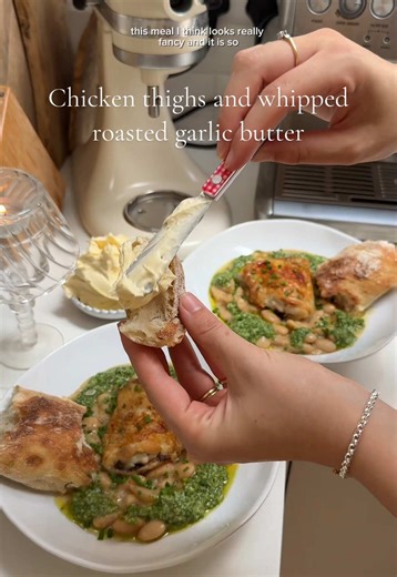 If I had friends coming over for a last minute supper… this is what I’d cook for them 🧄 🧈 Braised pesto butter beans with crispy chicken thighs and whipped roasted garlic butter 🥂 This meal is so good and looks really impressive despite being relatively simple and cooking in under an hour. A perfect one for if you have 1 or 2 guests and want to home cook something special but not too intense. Ingredients: Butter: - Garlic Head - Pack of Butter - Sea salt Beans: - 2 Jars Butter beans - Lemon -