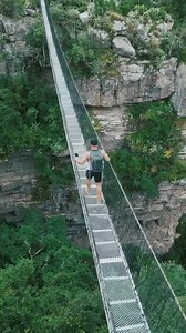 10K views · 98 reactions | GULP!  Nestled within the Oribi Gorge Nature Reserve in KwaZulu-Natal, Lake Eland's 100m high hair-raising suspension bridge promises an adrenaline rush like no other. Suspended high above the gorge floor, it sways as you walk. The question remains: are you brave enough to cross it? 朗  Video by @kelvyjohnson | South African Tourism UK | Facebook