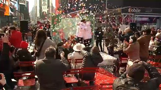 Couples gather in Times Square to express love, exchange vows on Valentine's Day