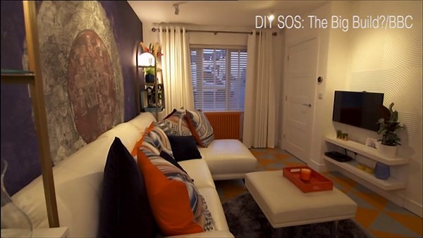 Incredible transformation of house on DIY SOS with orange kitchen