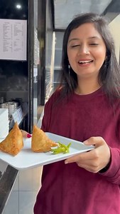 🎥 How Utsavva Eats Her Samosa 🍴✨ At the OSHO International Meditation Resort, even the simplest joys can feel like a meditation. 🌿 Watch as Utsavva shares her unique way of savoring a samosa—a little ritual that turns every bite into a celebration! 🥟❤️ Because here, it’s not just about the food—it’s about being present for every flavor, every moment. #OSHOInternational #LifeAtOIMR #MindfulLiving #MeditativeMoments | OSHO International Meditation Resort