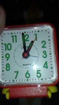 How to set alarm in a alarm clock named orpat quarts