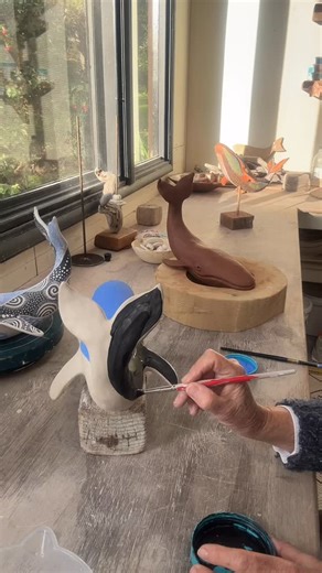Jena Bedson on Instagram: "🌊🐋 My ceramic whales are a true labour of love, each one individually decorated using the sgraffito technique. This process involves carefully carving through layers of slip to reveal the clay beneath, creating delicate patterns and flowing textures that bring each whale to life. No two are ever the same, every piece has its own unique story etched into the surface. I’ll be sharing these whales (and much more!) at my Open Studio as part of the Upper Yar