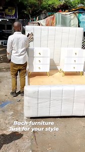 8.8K views · 845 reactions | This clean-lined platform bed from BACH features a glam tall headboard with channel tufting, creating a bold statement in your bedroom. Upholstered in luxurious velvet in a neutral hue, this bed is both stylish and cozy. The frame is made from engineered wood, and it rests on short tapered feet for a mid-century silhouette. We love how the finished back makes for easy placement in any sleep space. | BACH Furniture | Facebook