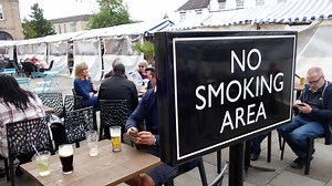 Ban smoking outside pubs and on beaches, major report suggests