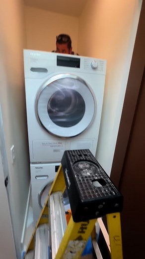 Tight squeeze for an appliance closet? We’ve got a Leo for that! 🛠️ Fun on the job site today with this sleek Miele stackable washer dryer install. Space may have been limited, but these machines are a perfect fit—and they look damn good too. Hashtags: #Miele #ApplianceInstall #StackableWasherDryer #LaundryGoals #DesignBuild #BorrelliDesign #JobSiteLife #ClosetLaundry #CustomCabinetry #ApplianceCloset #TightSqueeze #SanDiegoDesign #BehindTheScenes | Borrelli Design Cabinetry