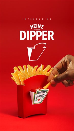 Fries 🤝 HEINZ ketchup – perfected. Introducing the HEINZ Dipper, a first-of-its-kind fry box with a built-in condiment compartment, designed to make enjoying fries and ketchup on-the-go easier than ever. Launching across 11 countries, the patent-pending HEINZ Dipper is the brand’s most widespread global activation to date. Learn more about HEINZ’s latest innovation here: https://bit.ly/3ZdVXEe | Kraft Heinz
