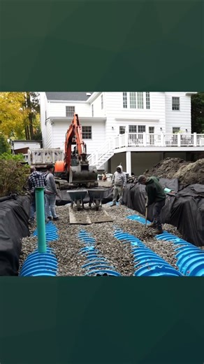 CULTEC chamber system being installed to permanently solve a severe flooding issue on this property
