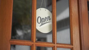Download Open sign hanging on the door glass at the coffee shop. Open sign board at the cafe, coffee shop, hotel, cafe restaurant or retail store for free