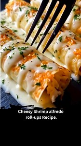 Shrimp sautéed in butter and garlic. Rolled in tender lasagna sheets with creamy Alfredo and mozzarella. Baked at 375°F for 20 minutes—melty, garlicky, and irresistibly cheesy. Ingredients: 10 fresh lasagna sheets or crepes (store-bought or homemade) 1 lb large shrimp, peeled, deveined, and chopped 2 tbsp olive oil or butter 3 garlic cloves, minced 2 cups Alfredo sauce (store-bought or homemade) 1 ½ cups shredded mozzarella cheese ½ cup grated Parmesan cheese Salt & pepper, to taste Fresh parsle