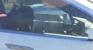 Is This Tesla Mobile Service Technician Sleeping Behind The Wheel? | Carscoops