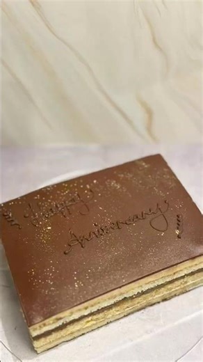 Gâteau Opéra - Almond sponge layered with coffee & chocolate filling, finished with chocolate glaze