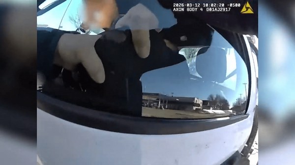 Dramatic bodycam video shows Milwaukee officer clinging to tow truck before fatal shooting