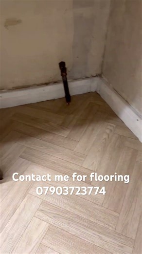 Herringbone style vinyl flooring installation in kitchen | beautiful kitchen floor makeover