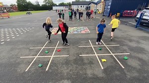 Noughts and Crosses PE = Fun Times! A really fun and simple game. All you need are two sets of 3 coloured bean bags and a Noughts and Crosses board (or you can use hoops). You play the game in teams of 3v3, and each child places down a bean bag as their marker. Once they have, they tag the next person to do the same. After all three bags have been placed, the next player has to pick up one of their bean bags and move it somewhere else to try to make a row of 3 and win. Once the children get the 