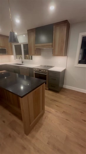 From a dated 60s kitchen to a modern showpiece 🌿✨ Watch this space transform from old finishes and tight layout into a fresh, stylish kitchen built for today’s living. We brought in bold green cabinetry, updated every surface, and added a beautiful plant wall to bring warmth, colour, and life back into the heart of the home. A total glow-up that proves thoughtful design can completely reshape a space. 🛠️🤍🌱 #edmonton #kitchenrenovation #interiordesign #contractor