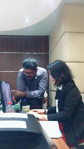 Humorous Office Interaction Between Colleagues