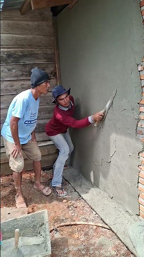 teaching a beginner to use plastering...