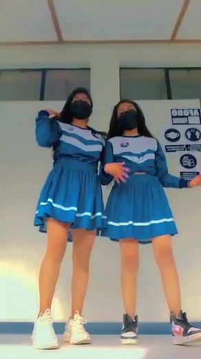 Synchronized Dance Routine in Cheerleader Outfits