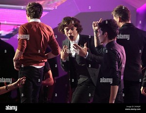 Harry Styles, of musical group One Direction, gestures as he wins the best pop video award for "What Makes You Beautiful" at the MTV Video Music Awards on Thursday, Sept. 6, 2012, in Los Angeles. (Photo by Matt Sayles/Invision/AP Stock Photo - Alamy