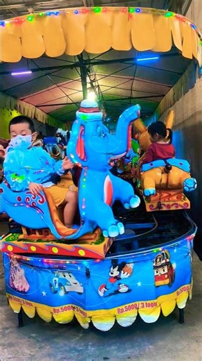 Riding the blue elephant merry-go-round #shorts #odongodong