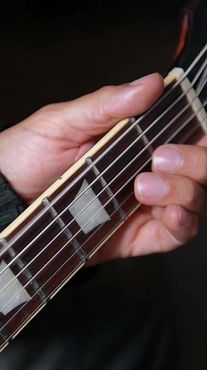 Easy but Heavy: play open E, D & G string, and fret 2 & 3. (Drop tuning)