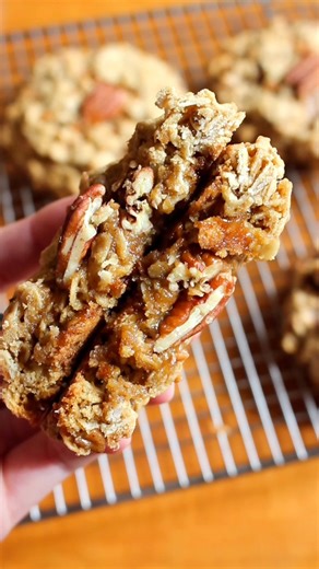 ⬇️ Recipe below! 🍪 Oatmeal Toffee Pecan Cookies are thick and chewy cookies full of hearty oats, sweet toffee, and nutty pecans. The pairing of toffee and pecans is so dang good! 😍 Get the recipe here - https://taffeybakery.com/oatmeal-toffee-pecan-cookies/ or comment RECIPE in the comments and I’ll send it directly to your inbox! 🥰 | Taffey Bakery
