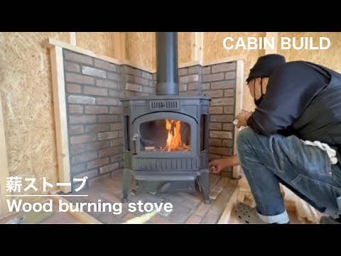 Installed a wood stove in the off-grid cabin. Chimney installation. I made hearth and hearth wall