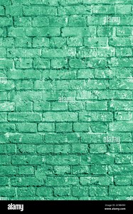 The background of the old green brick wall for design interior and  various scenes or as a background for video interviews Stock Photo - Alamy