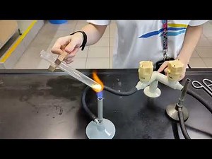 Heating zinc carbonate