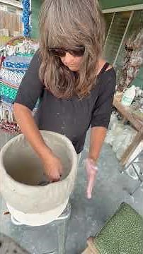 Building a coil pot with recycled clay