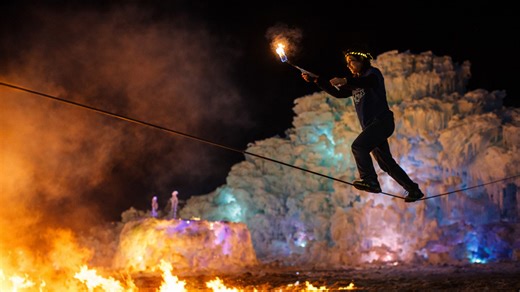 Balancing over fire and ice on a slackline