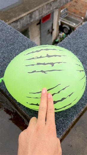 Experiment: Will a water balloon explode if it rolls down from a tall building? 💥🎈 #balloon