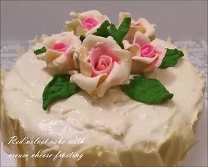 Red velvet cake with cream cheese frosting, white chocolate decorations, white modeling chocolate roses and leaves. 😋 | nadiyaskitchen.com