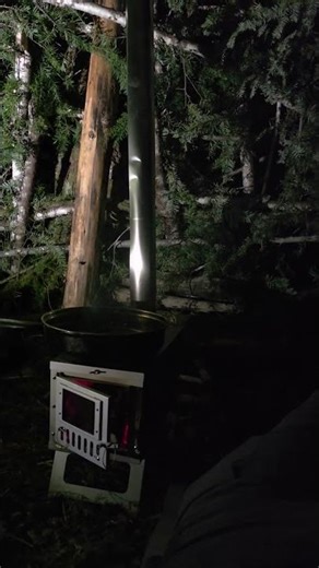 Cozy folding stove in tonight's shelter. #bushcraft #pnw