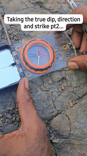 Taking True Dip and Strike Using a Compass Clinometer Learning how to measure the true dip and strike is fundamental in geological mapping. These measurements help us understand the orientation of rock layers, faults, and mineralized zones. With a compass clinometer, the geologist aligns with the strike direction and reads the dip angle perpendicular to it , turning field observations into real geological insights. #GeologyInAction #FieldMapping #StructuralGeology #NCGideon #MiningEducation #Exp