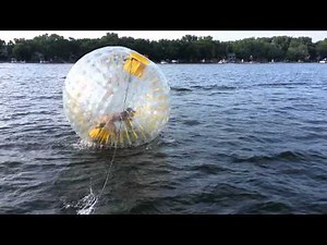 Zorb Ball on Water. Human Hamster Ball running on water.