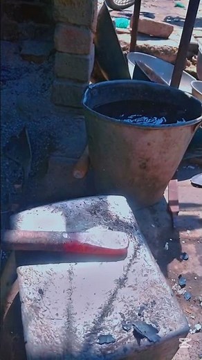 Medieval forging technique -Shaping two long rod in fire