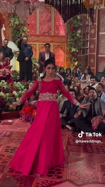 Traditional Dance Performance in Vibrant Pink Dress