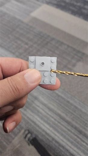 Bevins Bricks on Instagram: "If you want to drill holes in your lego to run wires, I always recommend using a 1/8 bit. #drill #drilling #lego #bevinsbricks"