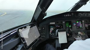 Real time cockpit scene. Jet ready for takeoff aligning in the runway with dense fog. Captain side view. 4K