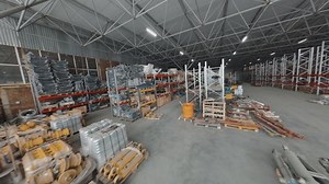 clip-1092877075-drone-tracking-view-warehouse-heavy-machinery-parts