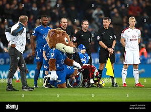 Leicester City's mascot Filbert Fox with match officials, Leicester City's Wes Morgan (left) and Burnley's Ben Mee (right) during the Premier League match at the King Power Stadium, Leicester. PRESS ASSOCIATION Photo Picture date: Saturday December 2, 2017. See PA story SOCCER Leicester. Photo credit should read: Mike Egerton/PA Wire. RESTRICTIONS: EDITORIAL USE ONLY No use with unauthorised audio, video, data, fixture lists, club/league logos or "live" services. Online in-match use limited to 7