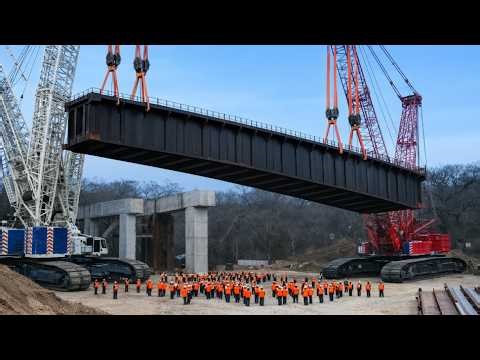 Two Monster Crawler Cranes Replace a Rail Bridge. Heavy Haul & Mega Projects.